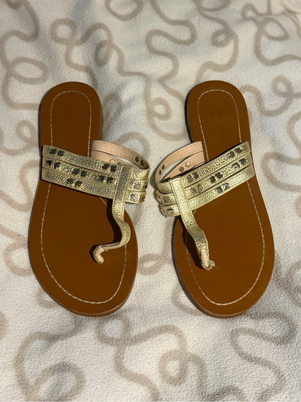 kate spade Gold Metallic Toe-Post Sandals with Tan Footbed